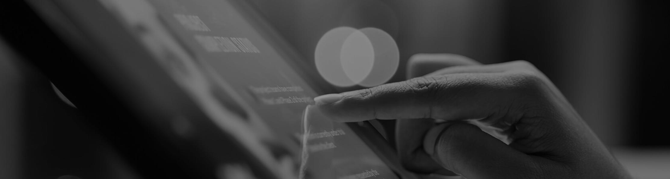 Image showing a close up of someone using a tablet