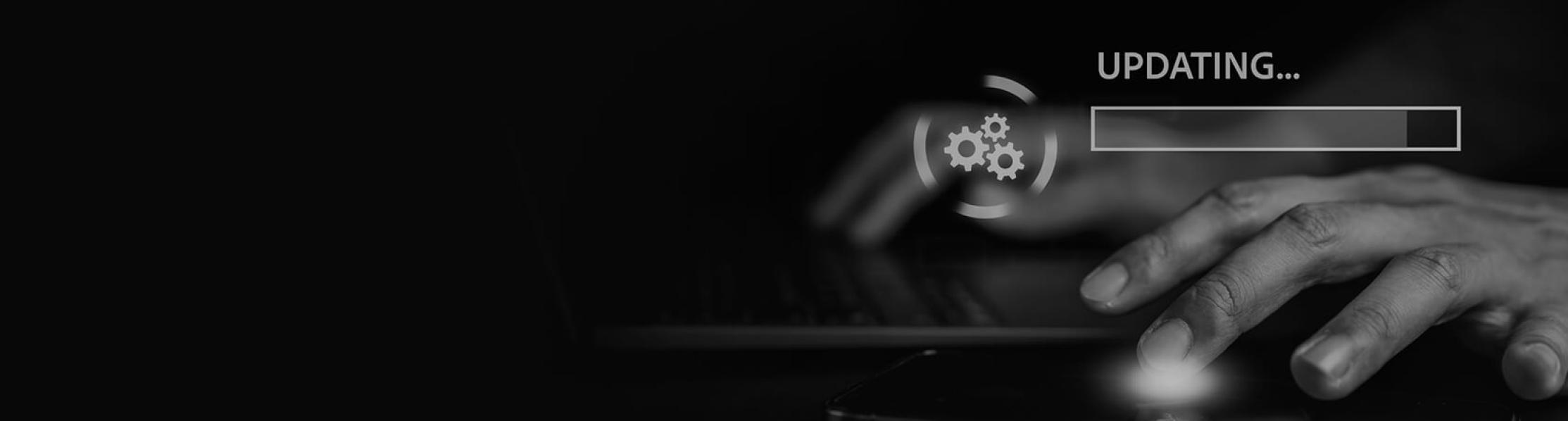 Image showing a close up of someone typing with a progress bar